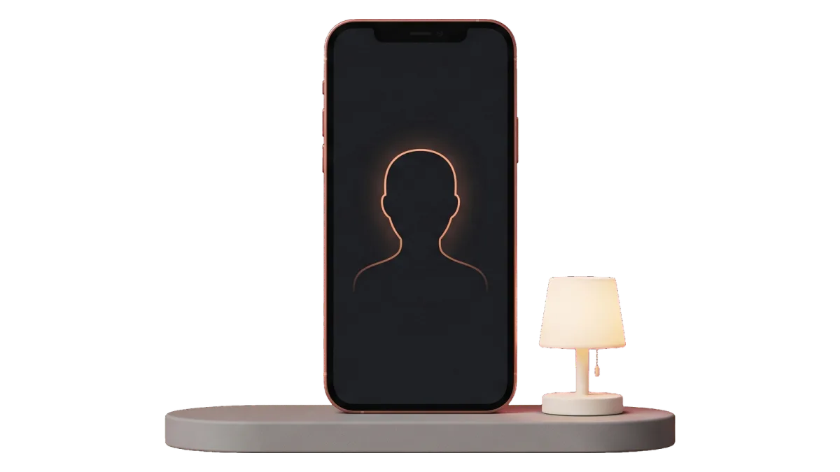 A phone on a shelf beside a small lamp, showing the outline of a head where the next photo will line up